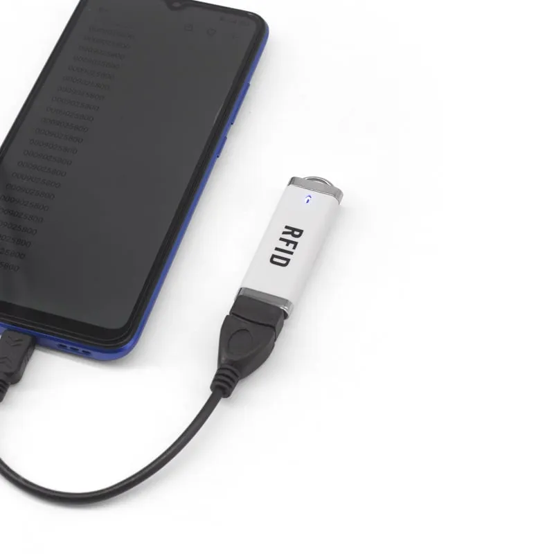 L210-U connected to an Android phone through an OTG adapter, card numbers on screen