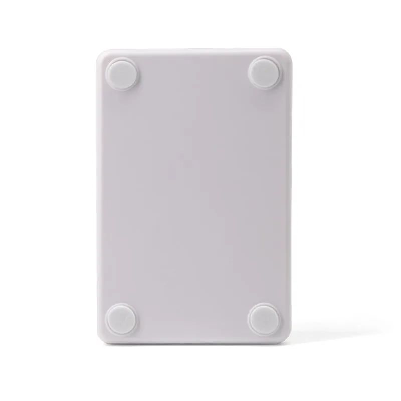 U120-U UHF desktop reader/writer, underside with four rubber feet